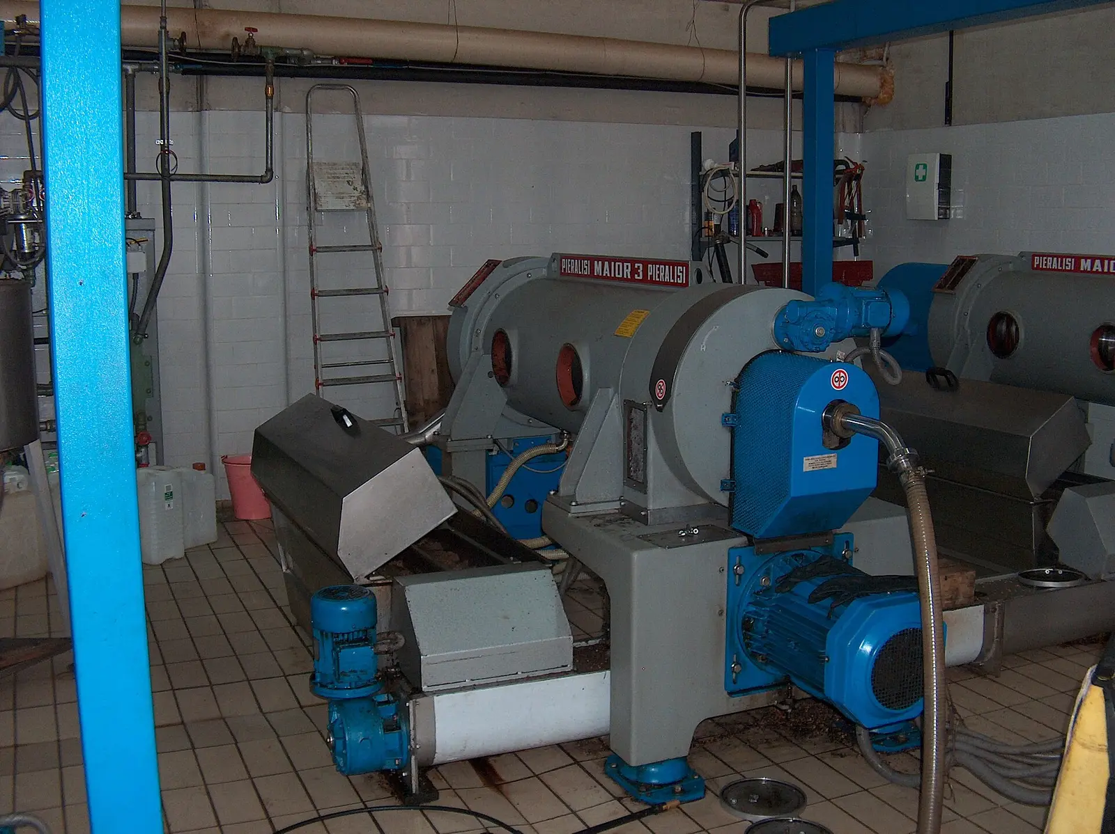 Horizontal decanter centrifuge, Pieralisi decanters with drive motors installed in an olive oil mill
